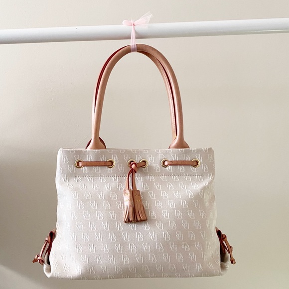 Dooney & Bourke Handbags - Dooney & Bourke Tassel Beige Mini Handbag